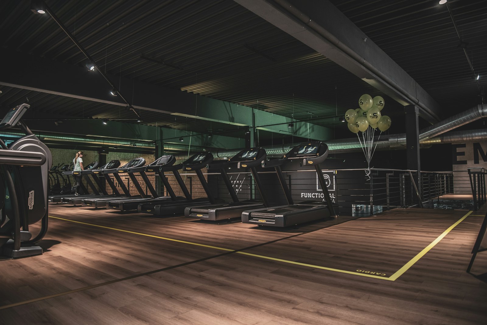 Dark modern gym floor