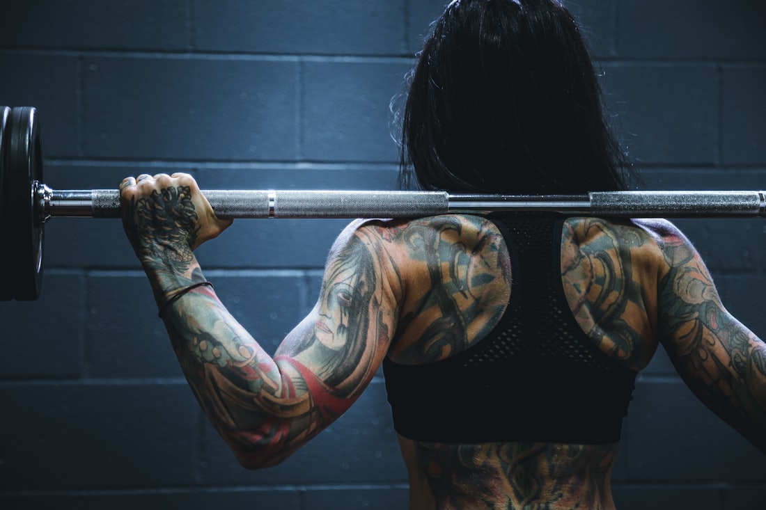 Athlete squatting with a barbell